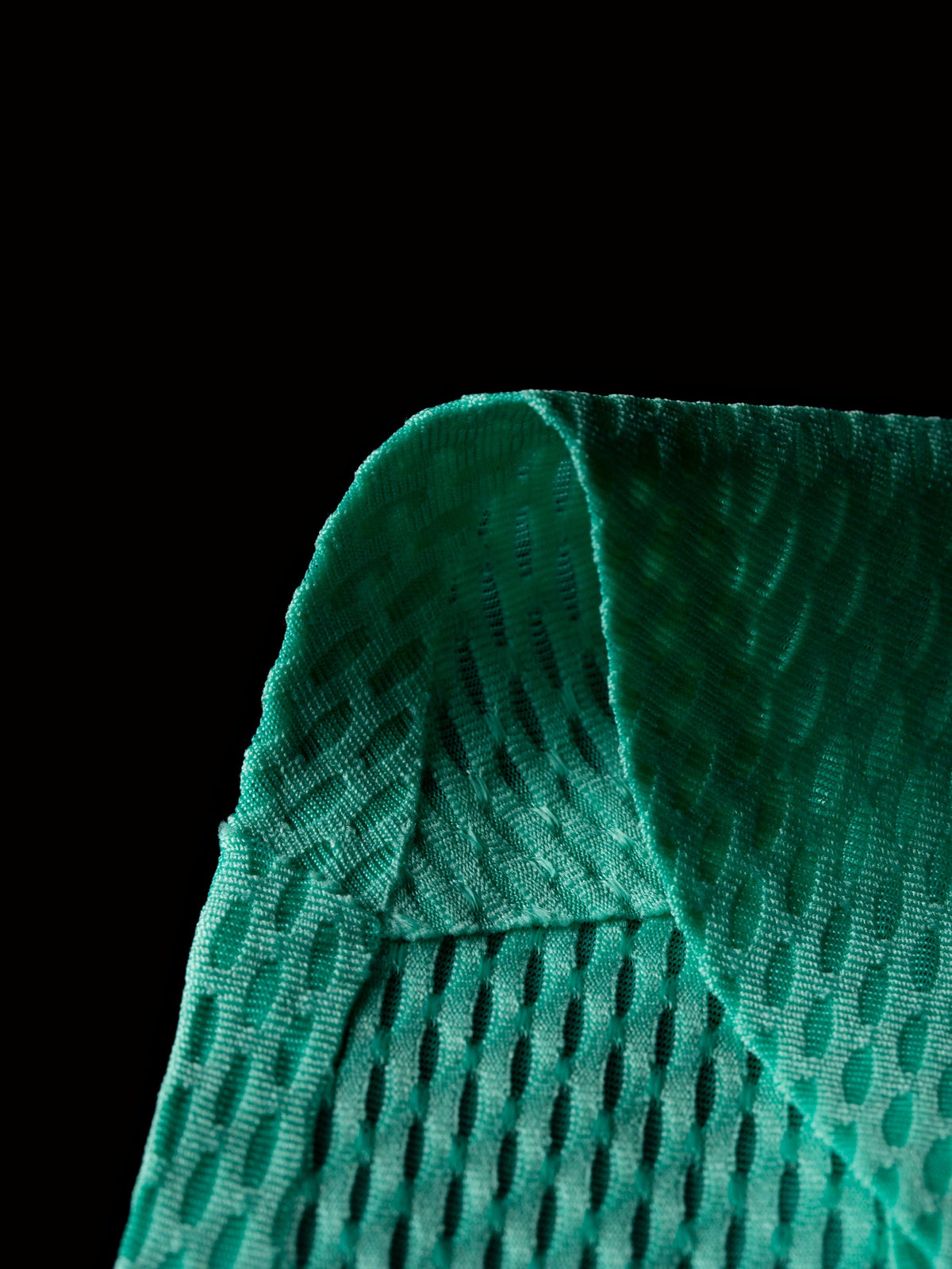 Close-up view of the heat-bonded shoulder construction.
