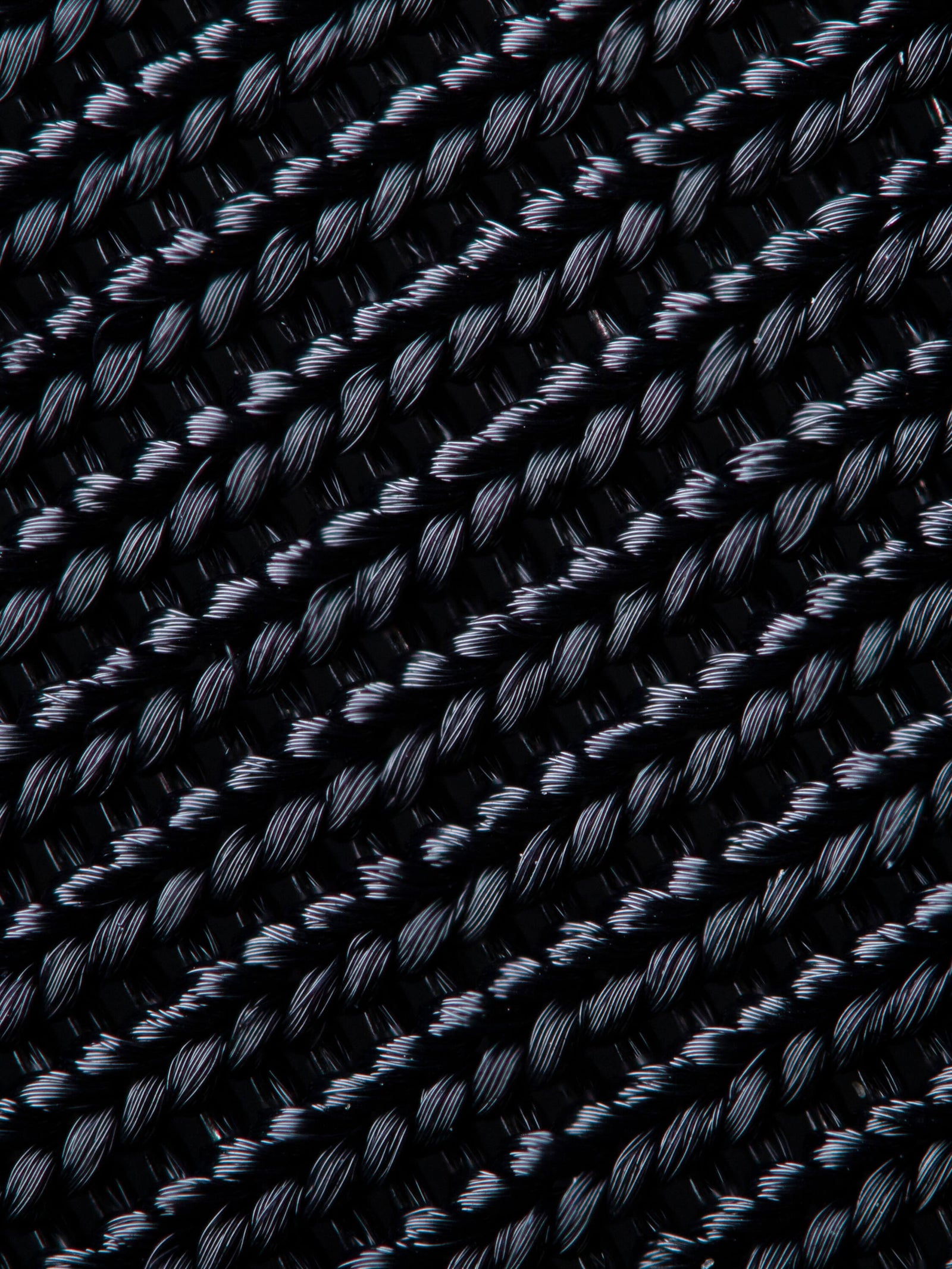 Ultra-closeup view showcasing thread fibres and knitting structure
