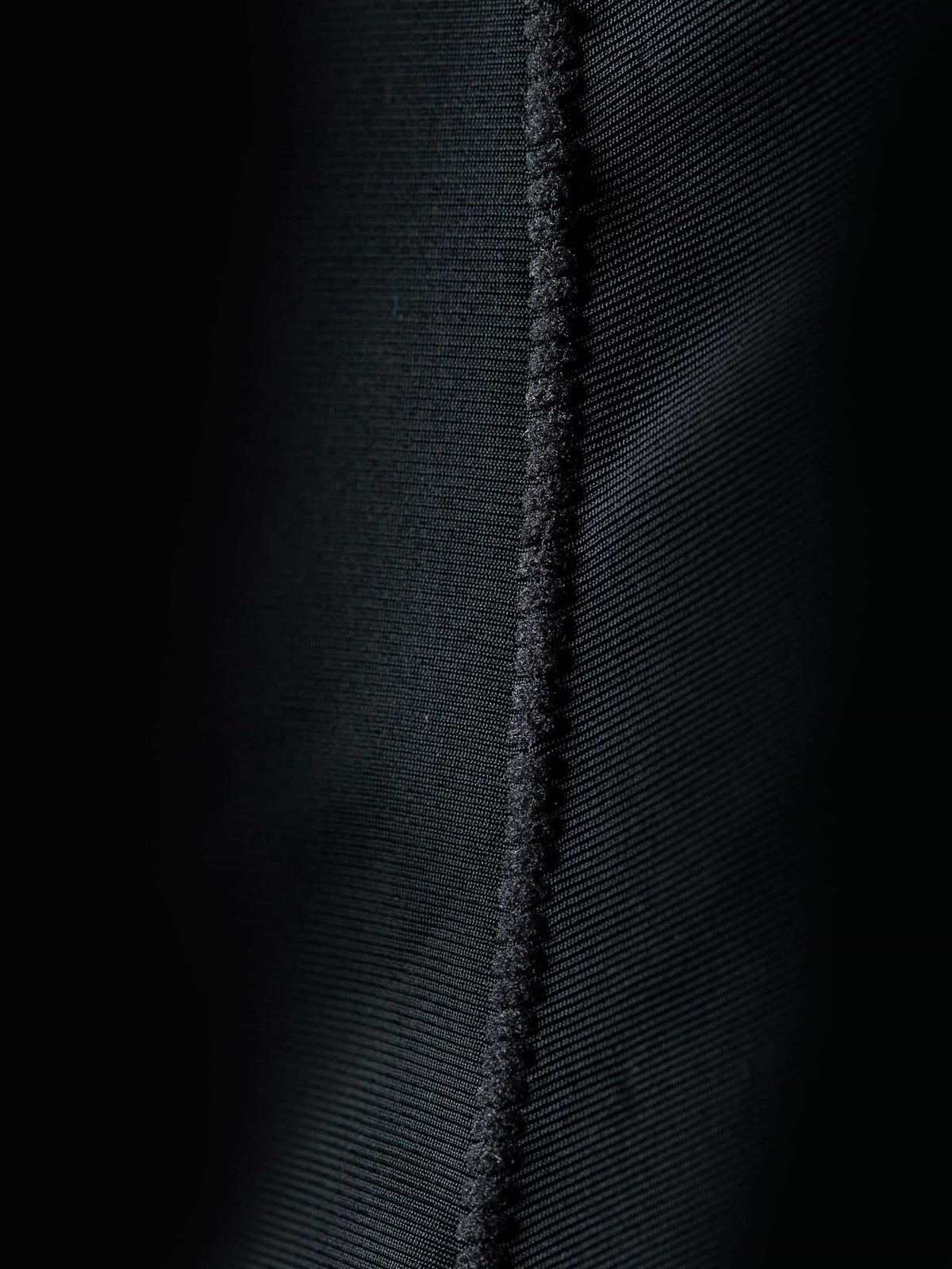 Close-up showing the flatlock stitching to minimise chafing.
